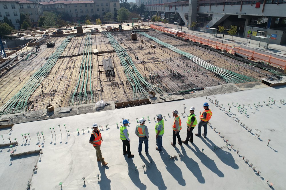 Construction team reviewing a live project site
